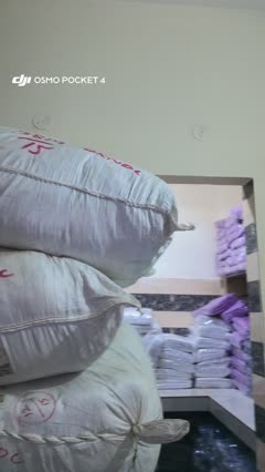 Packed garment stock in a room shown in the Delhi warehouse walkthrough